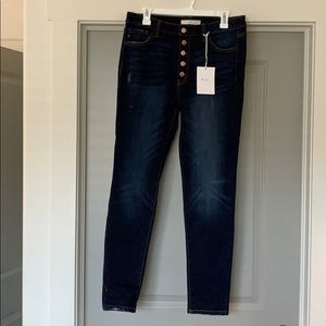 High rise skinny jeans with button fly